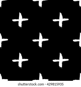 Hand drawn seamless pattern. Black and white, grunge textured monochrome vector illustration. Brush made abstract background. Hipster monochrome texture with crosses or pluses. Trendy graphic design.