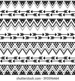 Hand drawn seamless pattern in boho chic style. Abstract wallpaper with ethnic aztec ornament.