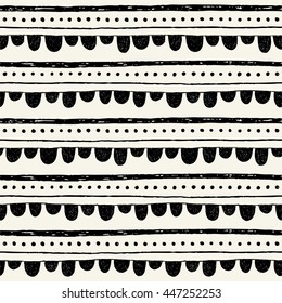 Hand drawn seamless pattern with bunting, stripes and dots. Black and white background with horizontal tracery. Monochrome decorative ornament in vector