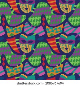 Hand drawn seamless pattern with carnival masks and colourful abstract elements. Blue backgroud. . For new year prints, textiles, paper.