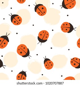 Hand drawn. Seamless pattern with cartoon ladybirds.