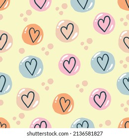 Hand drawn seamless pattern of color bubbles with hearts on yellow background.