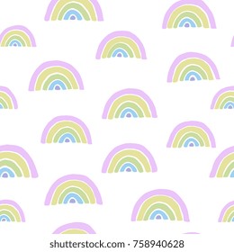 Dibujado a mano patrón sin fisuras con arcoíris de colores sobre fondo blanco.