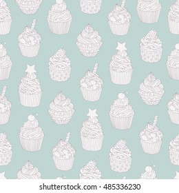 Hand drawn seamless pattern with cupcakes