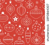 Hand drawn seamless pattern with cute hand drawn Christmas tree decorations, baubles. Repetitive New Year baubles print. Vector design in red and white. 
