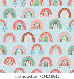 Hand drawn seamless pattern of cute rainbows with star, heart, cloud, moon. Colorful adorable doodle sketch illustration for greeting card, invitation, wallpaper, wrapping paper, fabric, baby room