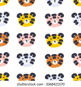 Hand drawn seamless pattern with cute tiger faces. Perfect for T-shirt, textile and print. Cartoon style vector illustration for decor and design.

