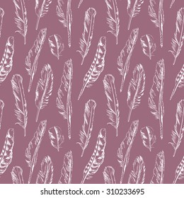 Hand drawn seamless pattern of different types of bird feathers