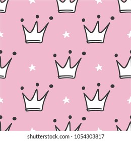 Hand drawn seamless pattern with doodle crowns. Cute baby and little princess design. Children's room wallpaper and clothes texture.