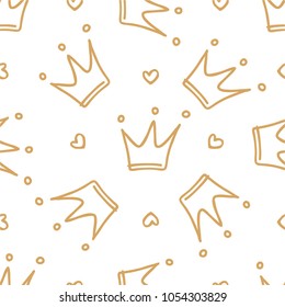 Hand drawn seamless pattern with doodle crowns. Cute baby and little princess design. Children's room wallpaper and clothes texture.