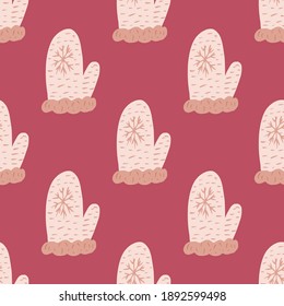 Hand drawn seamless pattern with doodle light mittens silhouettes. Pink background. Vector illustration for seasonal textile prints, fabric, banners, backdrops and wallpapers.