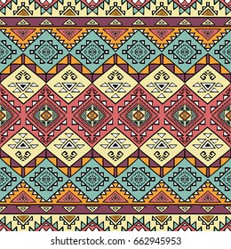 Hand drawn seamless pattern with ethnic aztec motives. Bright colored abstract wallpaper in boho style.