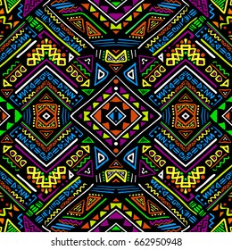 Hand drawn seamless pattern with ethnic aztec motives. Bright colored abstract wallpaper in boho style.