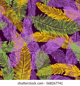 Hand drawn seamless pattern of feathers. Mardi gras color.