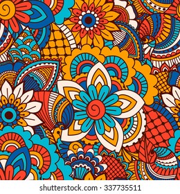 Hand drawn seamless pattern with floral elements. Colorful ethnic background. Pattern can be used for fabric, wallpaper or wrapping.