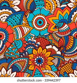 Hand drawn seamless pattern with floral elements. Colorful ethnic background. Pattern can be used for fabric, wallpaper or wrapping.