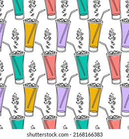 Hand drawn seamless pattern with icy glasses with straws and bubbles. Colorful background.