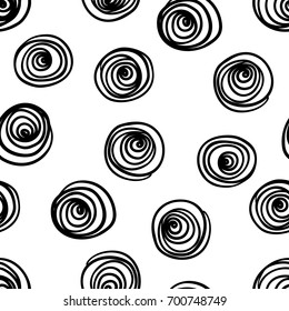 Hand drawn seamless pattern isolated on white. Endless vector primitive background with black circles. Stylish monochrome doodles. Vector illustration.