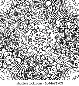 Hand drawn seamless pattern with leaves and flowers. Doodles floral ornament. Black and white decorative elements. Perfect for wallpaper, adult coloring books, web page background, surface textures.
