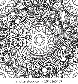 Hand drawn seamless pattern with leaves and flowers. Doodles floral ornament. Black and white decorative elements. Perfect for wallpaper, adult coloring books, web page background, surface textures.