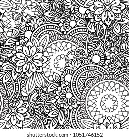 Hand drawn seamless pattern with leaves and flowers. Doodles floral ornament. Black and white decorative elements. Perfect for wallpaper, adult coloring books, web page background, surface textures.