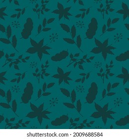 Hand drawn seamless pattern with leaves and twigs on a blue background. For textiles, notebook covers, cards and other printed products. Vector illustration. 