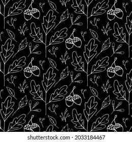 Hand drawn seamless pattern with leaves and acorns isolated on black backgound. Contrast ornamnet black and white. Line art vector illustration.