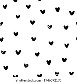 Hand drawn seamless pattern. Monochrome vector background with hearts. Design for T-shirt, textile and prints.