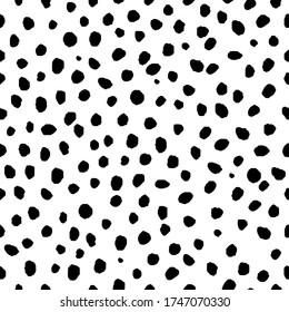 Hand drawn seamless pattern. Monochrome vector background with spots. Design for T-shirt, textile and prints.