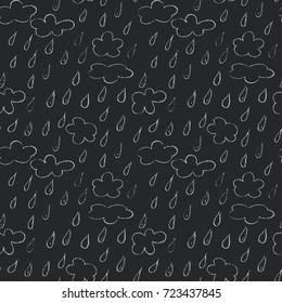 Hand drawn seamless pattern. Naive crayon drawn abstract background. Chalk board style vector backdrop with repeated motif. Clouds and raindrops pattern.