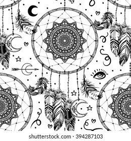 Hand drawn seamless pattern with Native American Indian talisman dream catcher with feathers and moon symbol. Vector illustration isolated on white. Lineart. Ethnic design, mystic tribal symbol. 