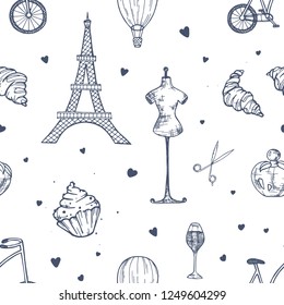 Hand drawn seamless pattern with Paris and France symbols - french perfume, bicycle, croissant, Eiffel Tower, mannequin, air balloon on white background. Vector illustration for wrapping paper.