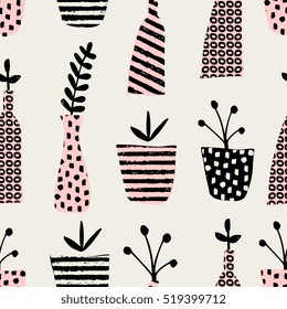 Hand drawn seamless pattern with plants in black, cream and pink.