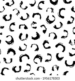 Hand drawn seamless pattern with polka dots in black and white. Trendy vector background with brush dots. Inky contemporary illustration for prints, fabric, wrapping paper