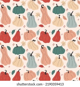 Hand drawn seamless pattern with pumpkins in bright colors with different shapes
