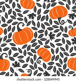 Hand drawn seamless pattern with pumpkins and leaves on the white background. Cute autumn vector texture.