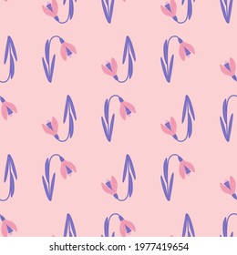 Hand drawn seamless pattern with purple colored galanthus flower print. Pastel pink background. Vector illustration for seasonal textile prints, fabric, banners, backdrops and wallpapers.