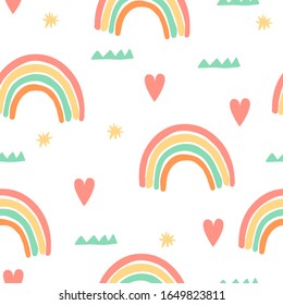 Diseño a mano sin fisuras con arco iris, corazones y estrellas. Vector de fondo infantil perfecto para tela, envoltura, textil. Estilo escandinavo. 
