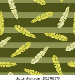 Hand drawn seamless pattern with random yellow tropic leaves elements. Green pale striped background. Flat vector print for textile, fabric, giftwrap, wallpapers. Endless illustration.