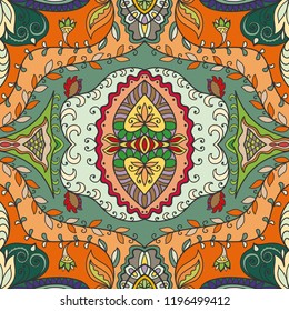 Hand drawn seamless pattern, repeating texture for textile fabric or paper print. Colorful doodle background with geometric and floral elements. Tribal ethnic mandala ornament for interior decoration