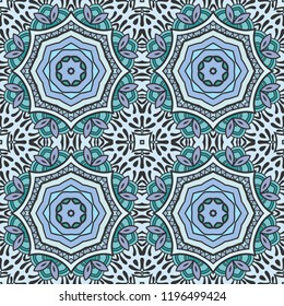 Hand drawn seamless pattern, repeating texture for textile fabric or paper print. Colorful doodle background with geometric and floral elements. Tribal ethnic mandala ornament for interior decoration