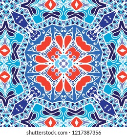 Hand drawn seamless pattern, repeating texture for textile fabric or paper print. Colorful doodle background with geometric and floral elements. Tribal ethnic mandala ornament for interior decoration