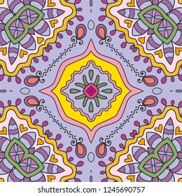 Hand drawn seamless pattern, repeating texture for textile fabric or paper print. Colorful doodle background with geometric and floral elements. Tribal ethnic mandala ornament for interior decoration