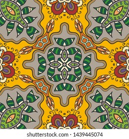 Hand drawn seamless pattern, repeating texture for textile fabric print. Colorful doodle background with geometric and floral elements. Tribal ethnic mandala ornament for scarf, shawl, hijab design