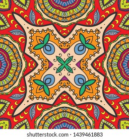 Hand drawn seamless pattern, repeating texture for textile fabric print. Colorful doodle background with geometric and floral elements. Tribal ethnic mandala ornament for scarf, shawl, hijab design