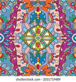 Hand drawn seamless pattern, repeating texture for textile fabric print. Colorful doodle background with geometric and floral elements. Tribal ethnic mandala ornament for scarf, shawl, hijab design