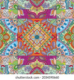 Hand drawn seamless pattern, repeating texture for textile fabric print. Colorful doodle background with geometric and floral elements. Tribal ethnic mandala ornament for scarf, shawl, hijab design