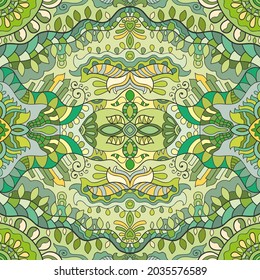 Hand drawn seamless pattern, repeating texture for textile fabric print. Colorful doodle background with geometric and floral elements. Tribal ethnic mandala ornament for scarf, shawl, hijab design