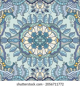 Hand drawn seamless pattern, repeating texture for textile fabric print. Colorful doodle background with geometric and floral elements. Tribal ethnic mandala ornament for scarf, shawl, hijab design