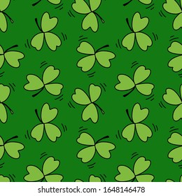 Hand drawn seamless pattern Saint Patrick's Day traditional symbol green  clover vector illustration isolated on green background.Design  best for wrapping, textile, wallpaper, greeting paper